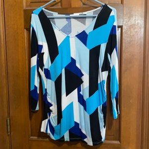 Blouse with beautiful blue abstract design.